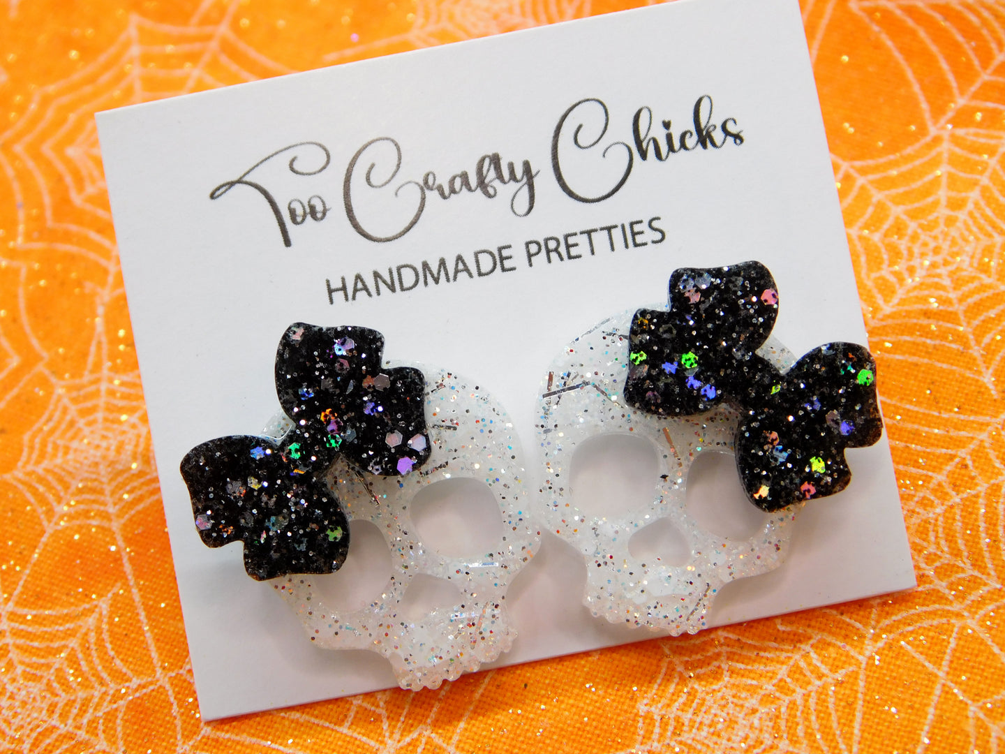 1 in. White Skull Black Bow Studs