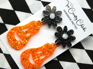 Orange Oblong Jack-O-Lantern Dangles w/ Black & White Flower Tops
