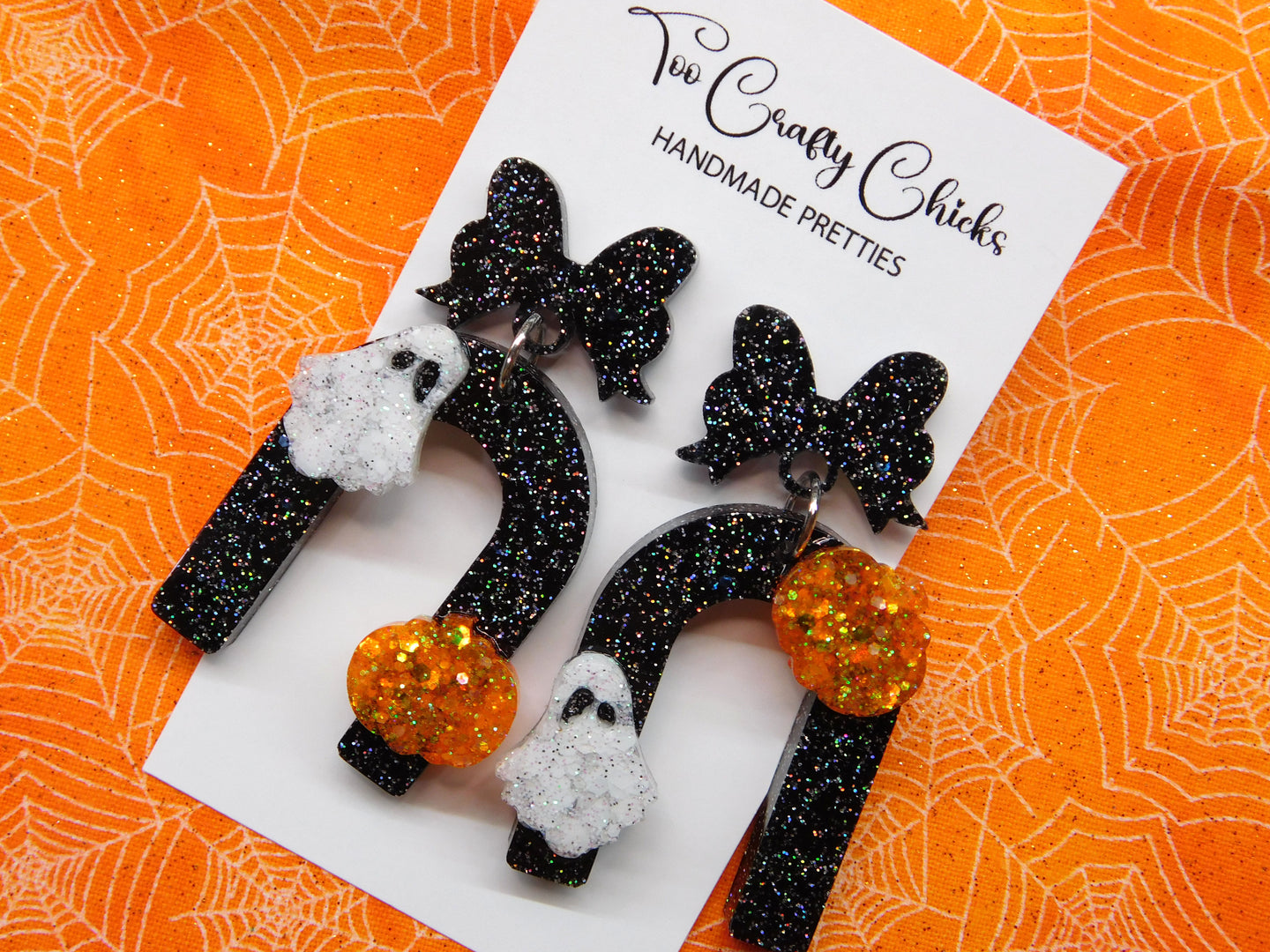 PRE ORDER - Orange Black & White Ghost & Pumpkin Arch Dangles w/ Bow Tops